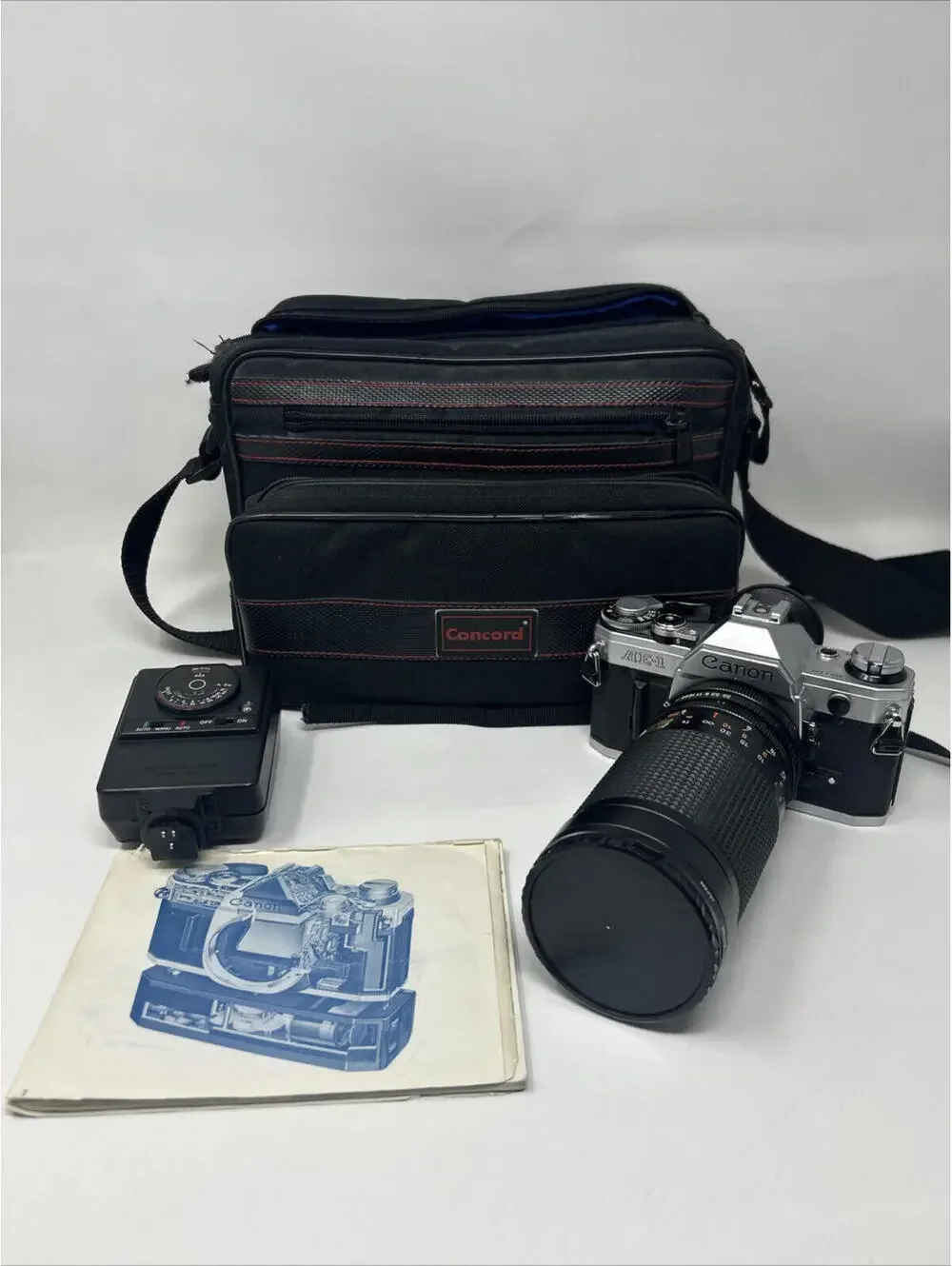 Canon AE-1 35mm SLR Film Camera. Comes With Bag- Flash - 35-200mm Zoom Lens - Picture 1 of 9